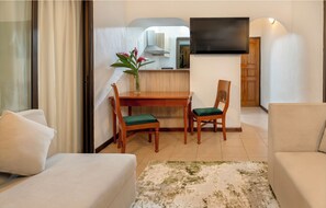 Deluxe-Vierbettzimmer | Wohnbereich