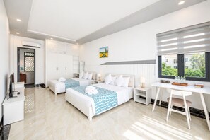 Family Room, Ocean View | Desk, bed sheets - Palette Casa De Sol Beach Resort (Phu Quoc)