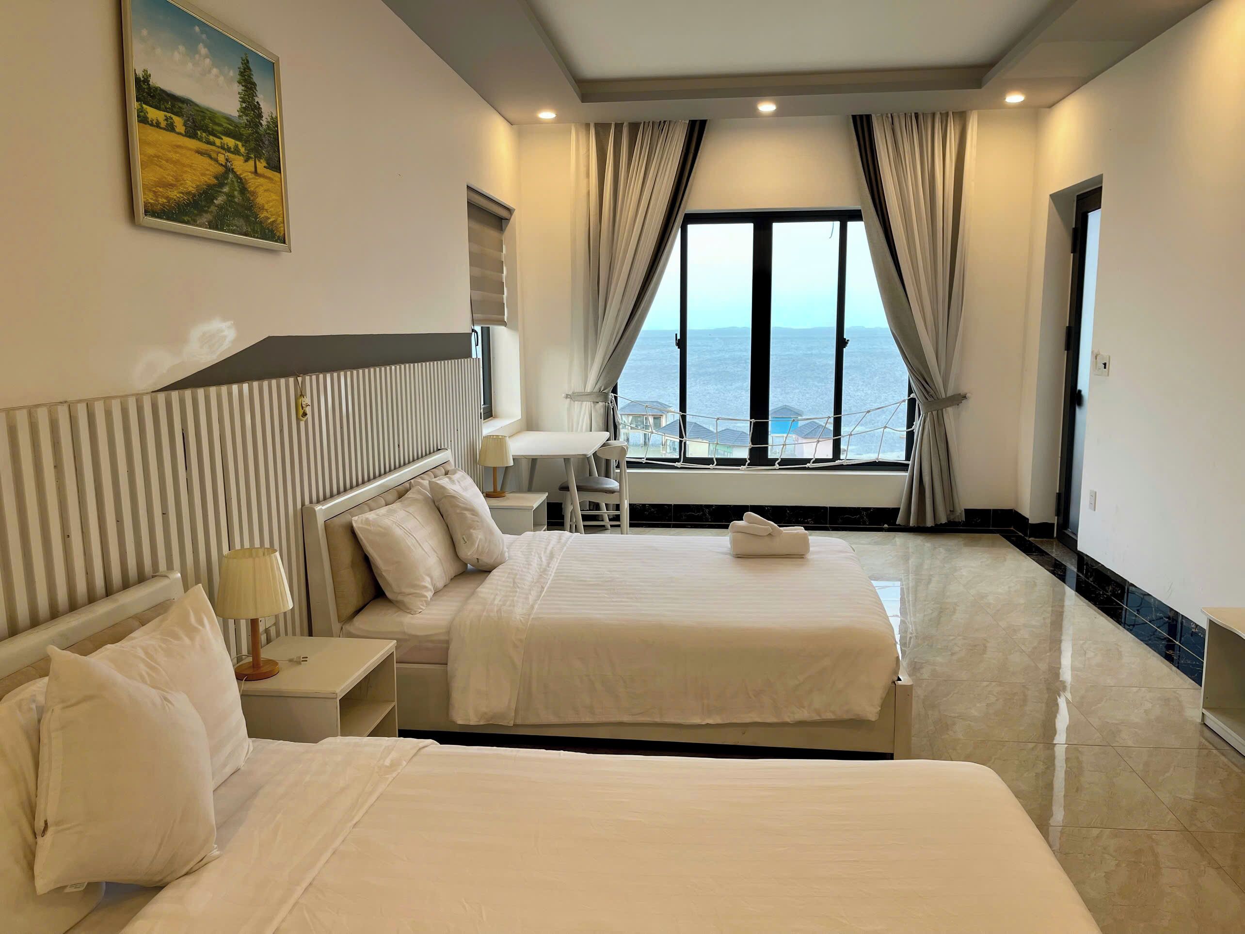 Habitación Deluxe con 1 cama matrimonial o 2 individuales, vista al mar