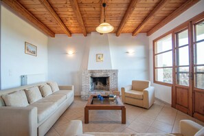 Living area - Hilltop maisonette in vasilikos with stunning sea views! (Vasilikos)