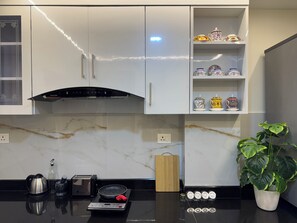 Private kitchen - 1BHK Near Boudha Stupa • Shama Suites (Kathmandu)