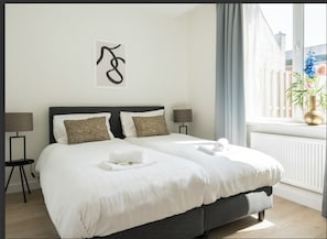 2 dormitorios, tabla de planchar con plancha, wifi gratis y ropa de cama