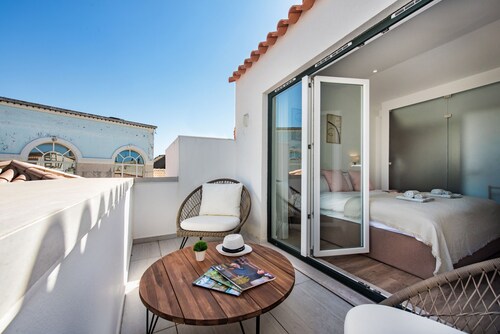 Faro Downtown - F in Faro