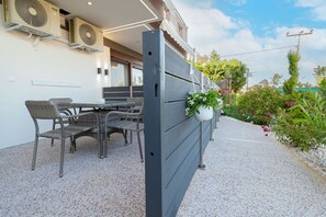Outdoor dining - Orestis Suite No 3 by RentalsPro - Nea Moudania (Nea Moudania)