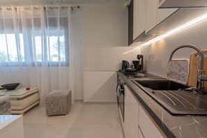 Fridge, microwave, oven, stovetop - Orestis Suite No 2 by RentalsPro - Nea Moudania (Nea Moudania)