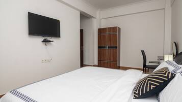 3 habitaciones, tabla de planchar con plancha, wifi y ropa de cama
