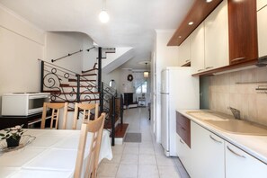 Fridge, toaster, cookware/dishes/utensils
