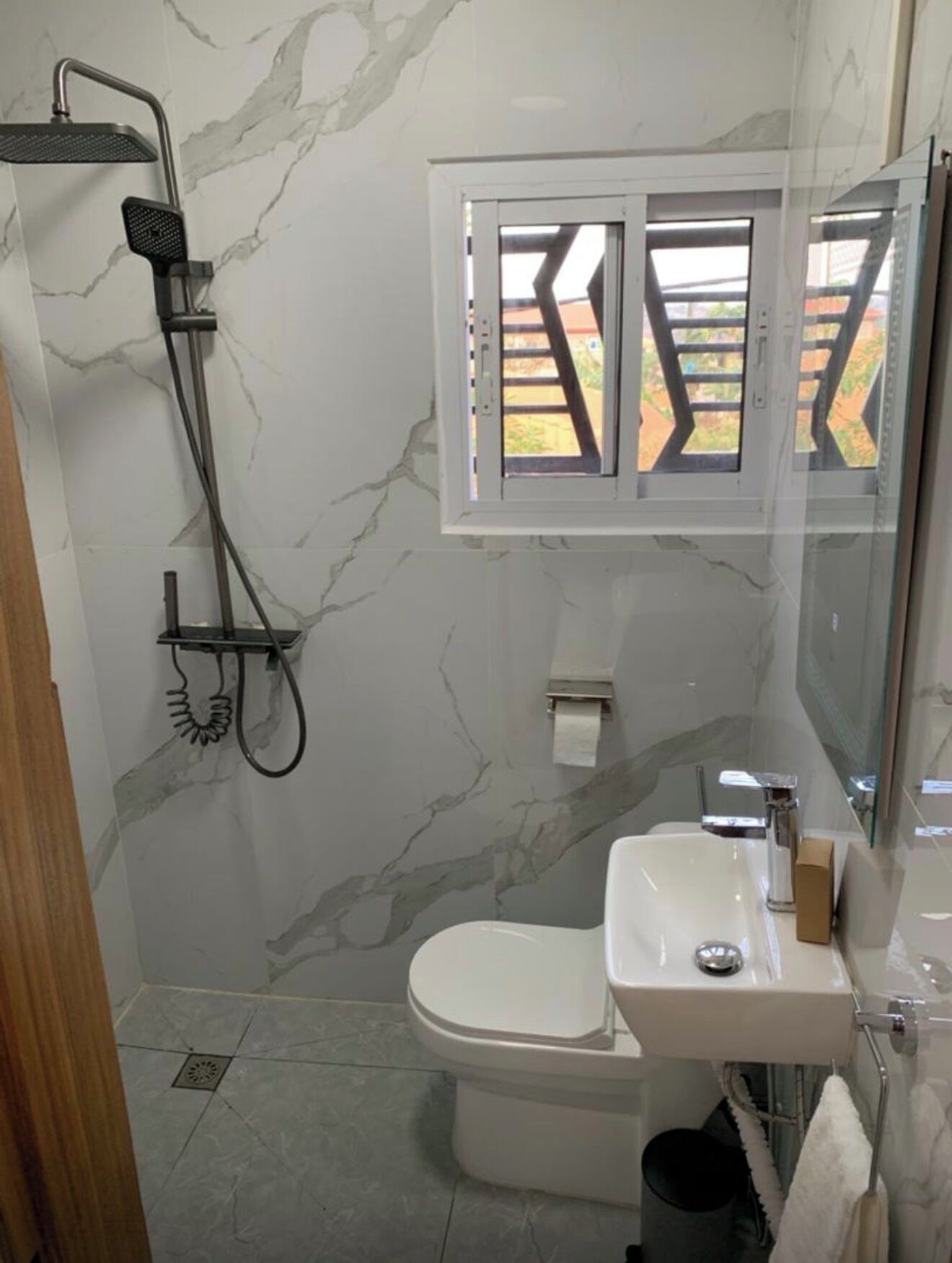 Hair dryer, towels, soap, shampoo