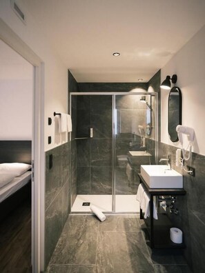 Family Quadruple Room, Non Smoking, Mountain View | Bathroom | Shower, hair dryer, heated floors, towels - Smarthotel Brenner24 - Self Check In (Brennero)