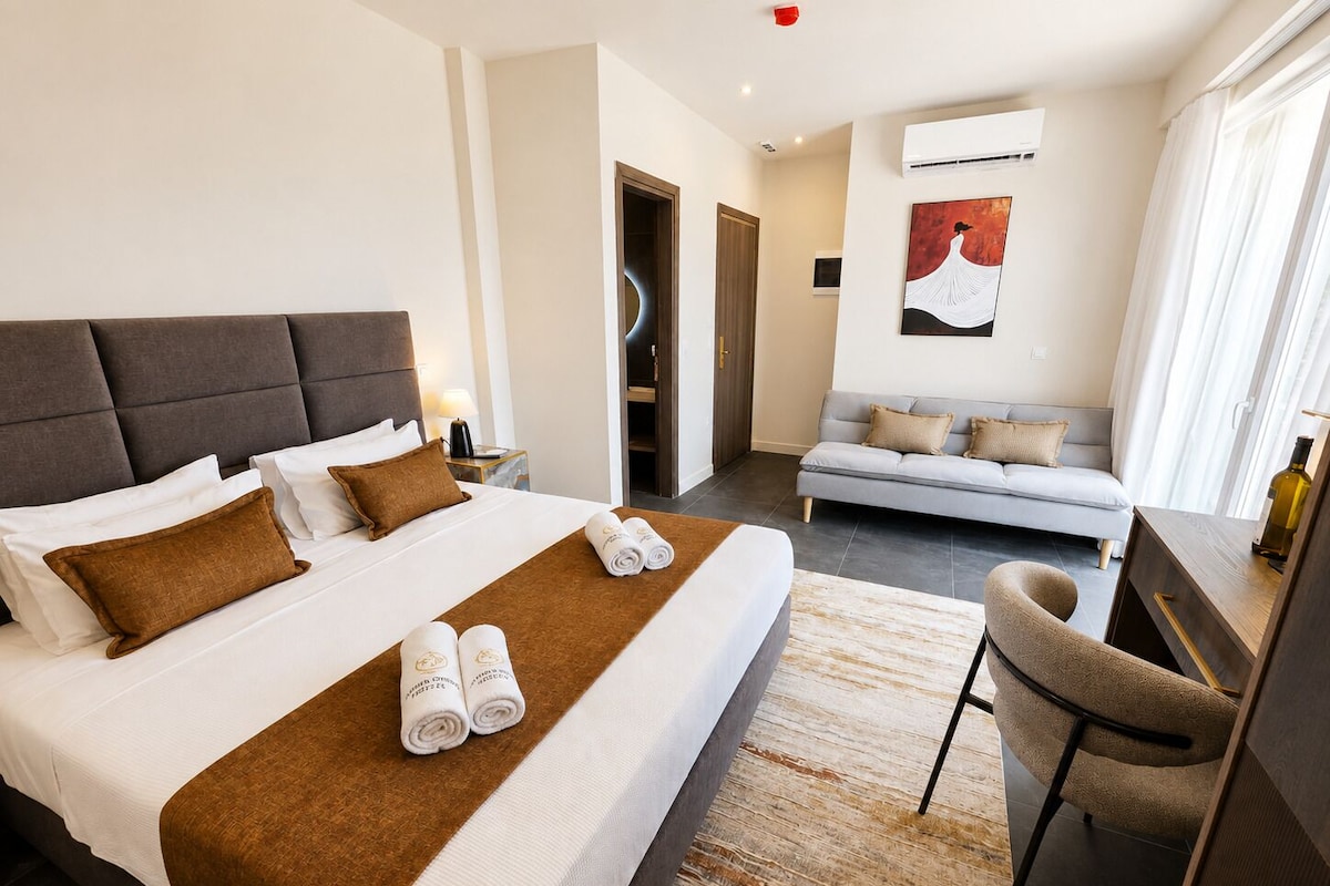 Deluxe Room with Balcony & Panoramic View | In-room safe, blackout curtains, iron/ironing board (on request)