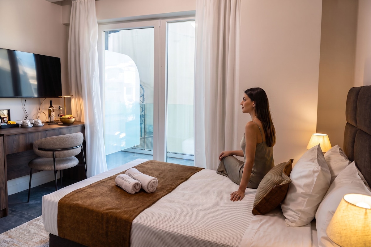 Classic Single Room with Balcony | In-room safe, blackout curtains, iron/ironing board (on request)
