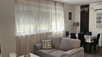 Classic Apartment, Pool View | Living area