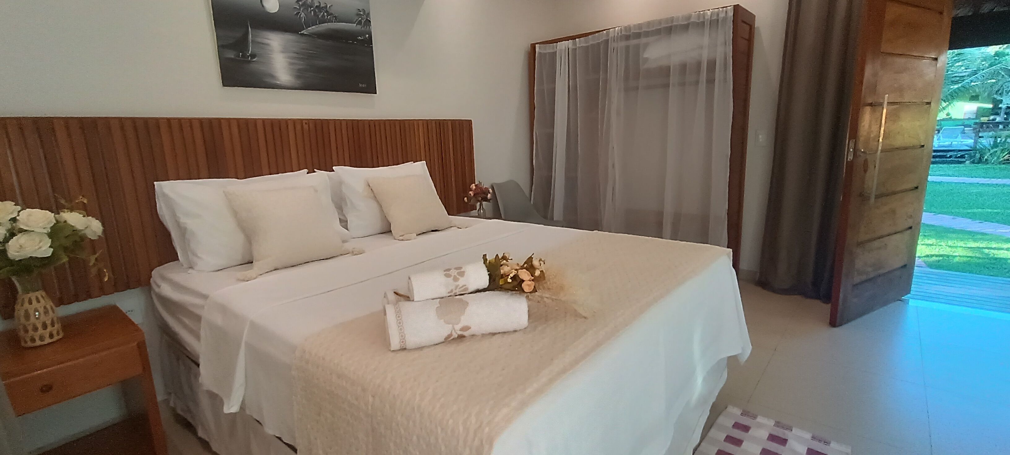 Stuga Deluxe - utsikt mot trädgården