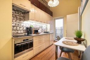 Departamento clásico, balcón | Cocina privada