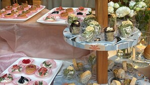 A tiered dessert display with various pastries and desserts. - VillaGrancassa Historic home from 1853 at the foot of the National Park (San Donato Val di Comino)