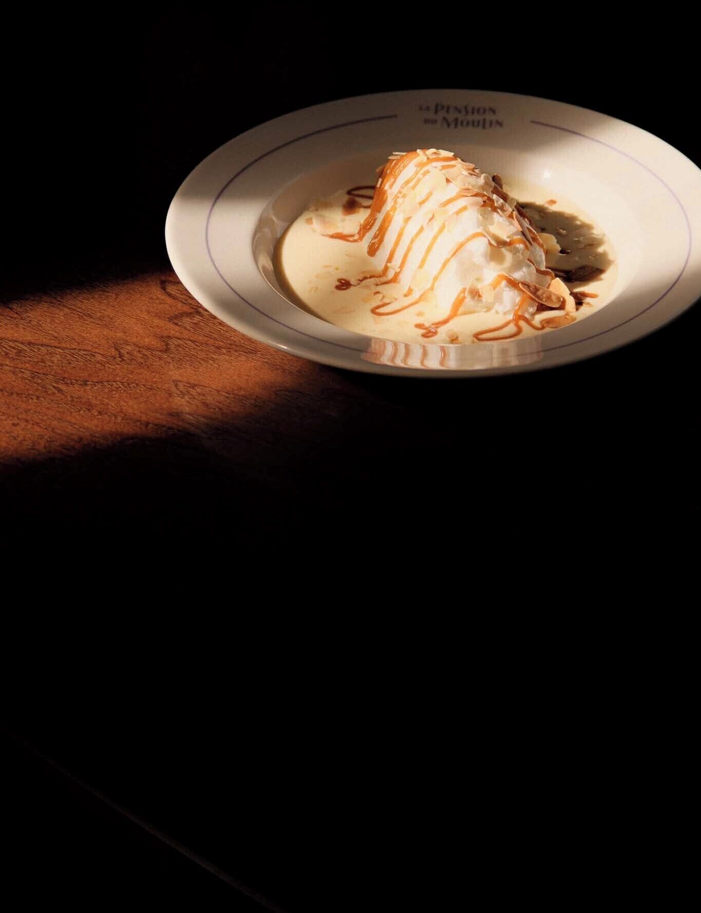 A dessert on a plate with a plate number visible.