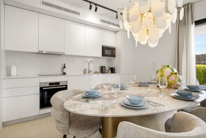 Fridge, microwave, oven, dishwasher - Golfside 3BR Apt with large Terrace, Pool & Spa (Mijas)
