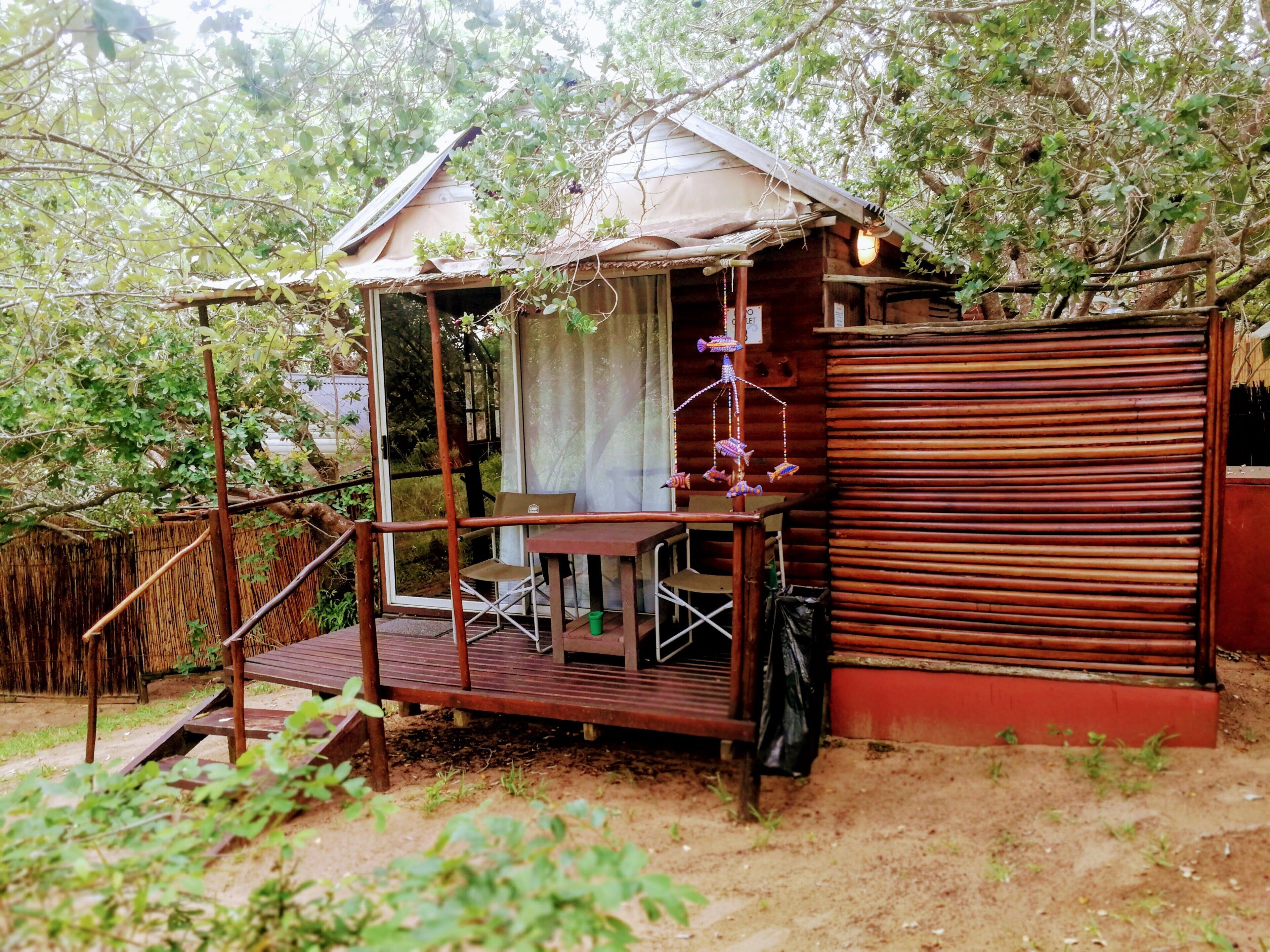 Cabaña estándar, vista al jardín | Restaurante al aire libre