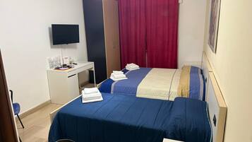 Habitació triple júnior, vistes al jardí