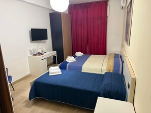 Habitació triple júnior, vistes al jardí