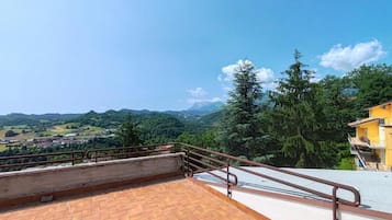 Family Triple Room, Balcony, City View | Property grounds