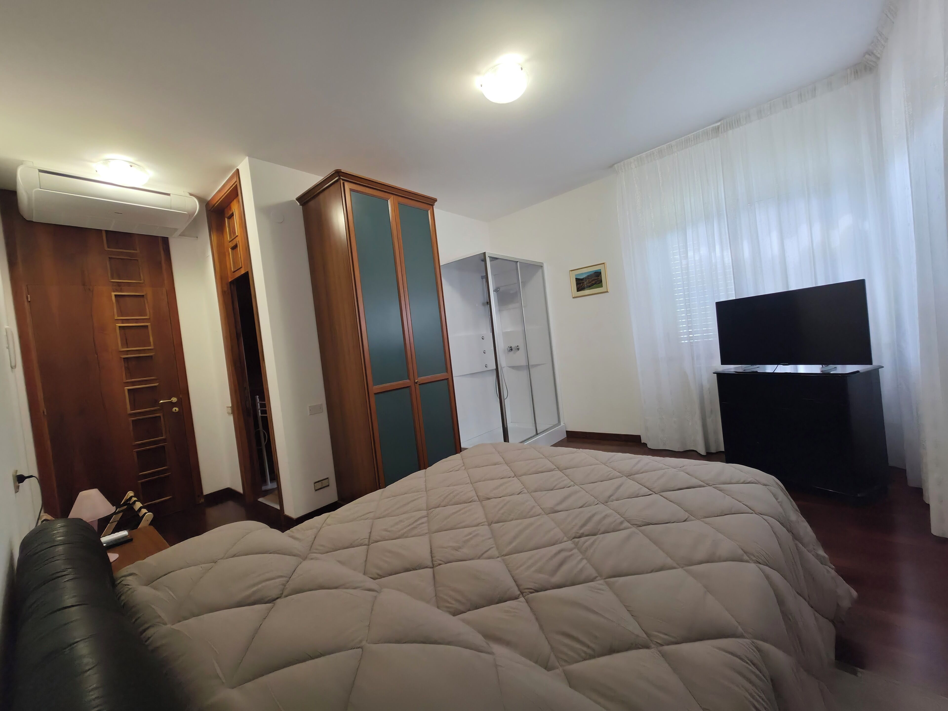Quarto casal standard, vista para o jardim