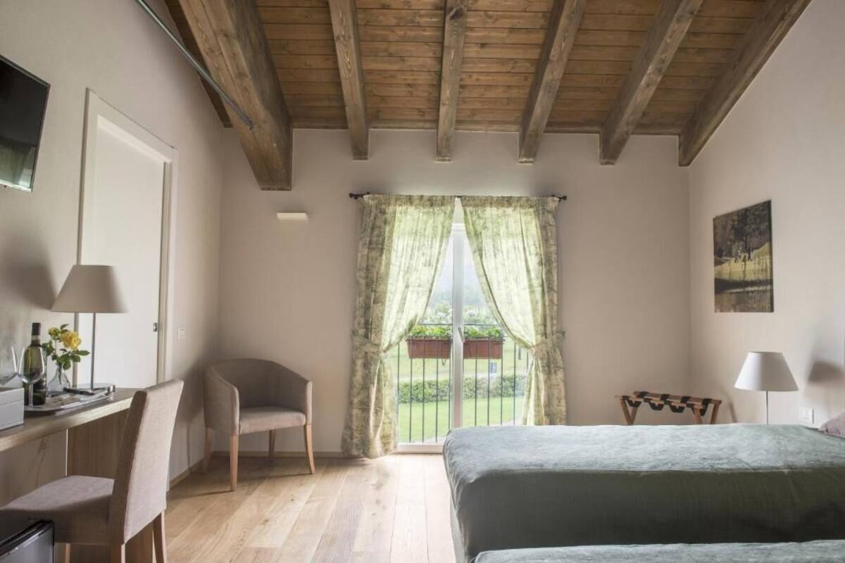 Superior Triple Room, Golf View | Minibar, in-room safe, WiFi (free), bed sheets