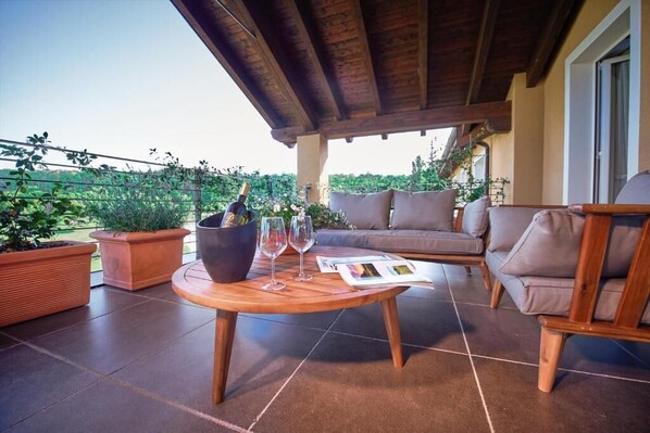 Luxury Triple Room, Balcony, Golf View | Terrace/patio