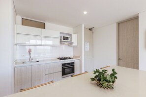 Basic Apartment | Private kitchen - U-GO Ocean Club Confort Bello Horizonte (Santa Marta)