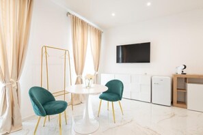 Luxury Suite, Balcony, City View | Free minibar items, blackout curtains, iron/ironing board, free WiFi