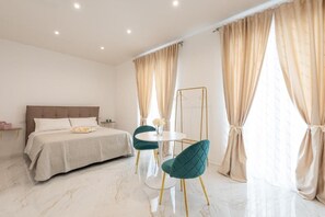 Luxury Suite, Balcony, City View | Free minibar items, blackout curtains, iron/ironing board, free WiFi