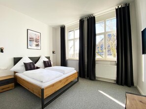 Chambre Confort double, non-fumeur | Rideaux d’obscurcissement, système d’insonorisation