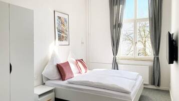 Blackout drapes, soundproofing, iron/ironing board, free WiFi
