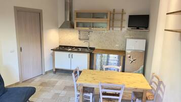 Apartamento, 2 quartos, acessível, varanda | Sala de jantar