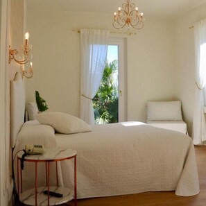 Classic Triple Room, Park View | In-room safe, free WiFi - Hotel du Parc (Stresa)