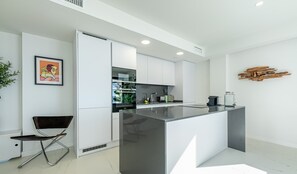 Fridge, microwave, oven, stovetop - Casa Camarate - Luxury 1BR Seaviews Pool Garden (Casares Costa)