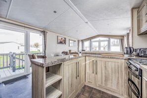 Fridge, microwave, oven, dishwasher - Lovely Lakeside Holiday Park Home  - Pass the Keys (Chichester)