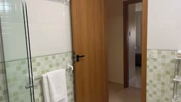 Shower, towels, toilet paper