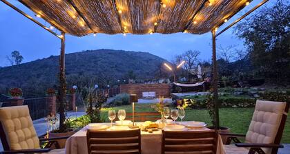 Panorama of Etna and sea, nestled in the park, swimming pool