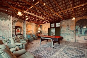 A room with a pool table, comfortable seating, and detailed murals on the walls. - Luxury Glam Pool Retreat Near Glenelg Beach-sleeps 10 (Dover Gardens)