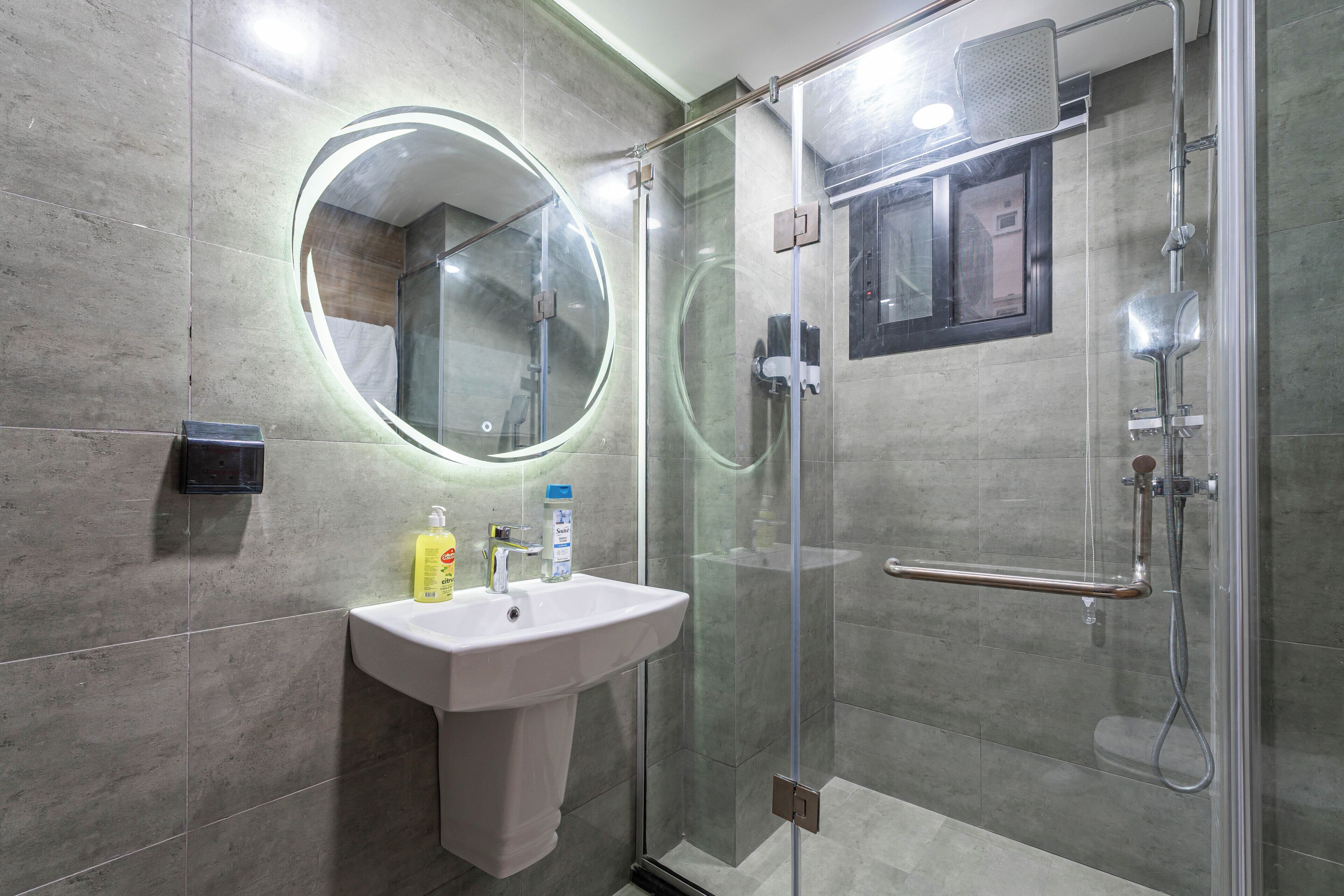 Shower, towels, soap, toilet paper