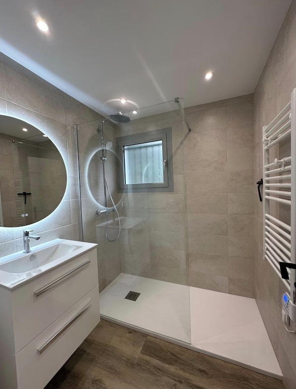 Shower, hair dryer, towels, soap