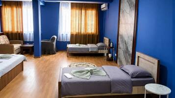 Classic Quadruple Room, City View | Desk, free WiFi