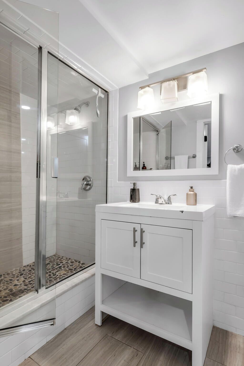 Shower, hair dryer, towels, shampoo