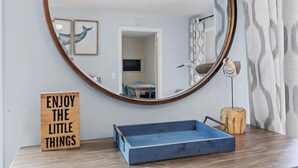 A bathroom with a wooden vanity, a blue basin, a mirror, and a motivational sign. - Lone Star-New! Sleep 8 in Seal Harbor! (Mount Desert)