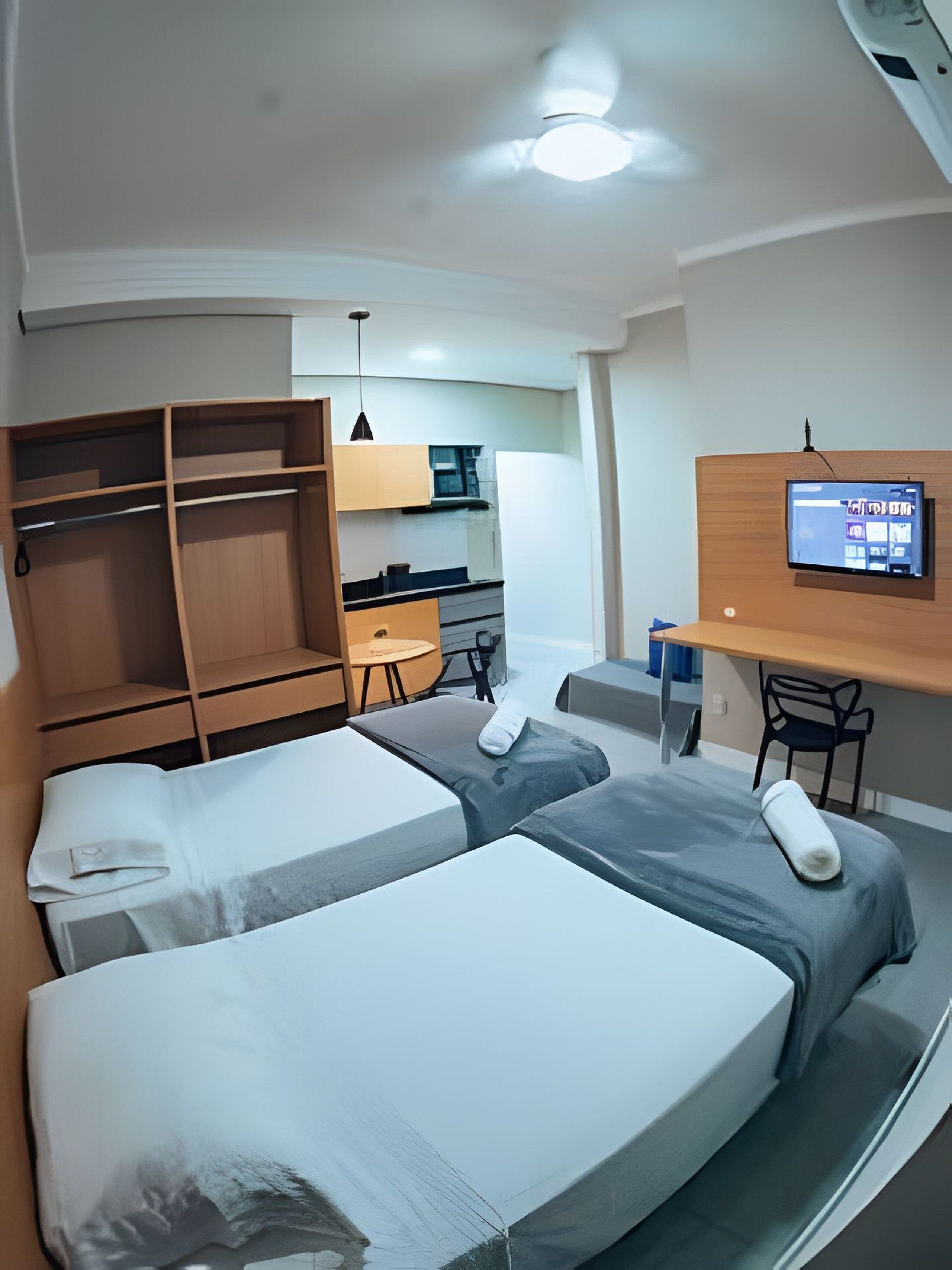 Apartamento executivo | Ferros/tábuas de passar roupa, Wi-Fi de cortesia