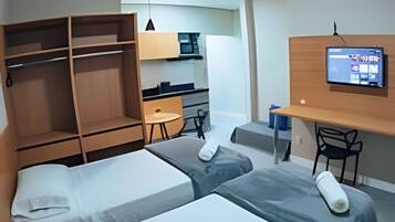 Apartamento executivo | Ferros/tábuas de passar roupa, Wi-Fi de cortesia
