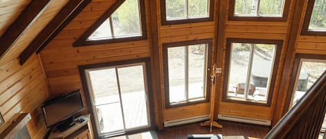 Chalet 4 ~ Rivière Ste-Marguerite | Living area | 40-inch flat-screen TV with satellite channels, TV, fireplace