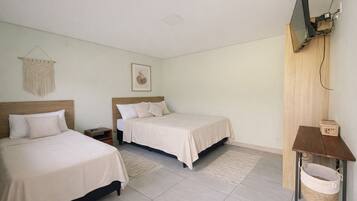 Quarto triplo executivo, 1 quarto, ar-condicionado | Roupas de cama antialérgicas, Wi-Fi de cortesia, roupa de cama