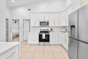 Fridge, microwave, oven, stovetop - Private Pool Oasis w/ Game Room & Outdoor Kitchen (Palm Coast)